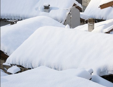 deep snow on roof tops